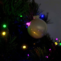 Coloured fairy lights on tree